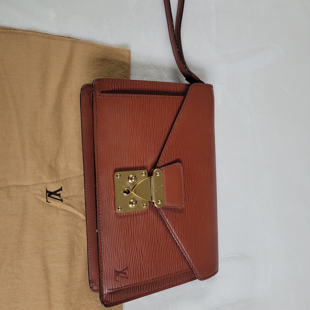 Louis Vuitton Dragonne Clutch Leather Crossbody with Gold Hardware
